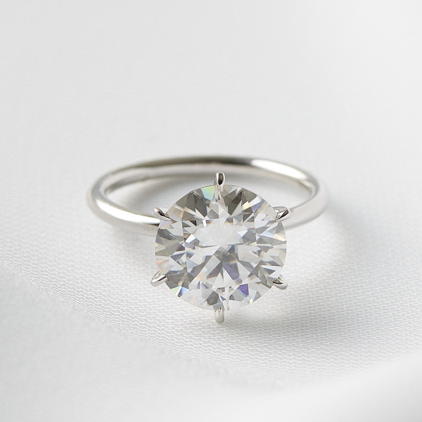 Round Solitaire 6 Claw Setting Moissanite Engagement Ring