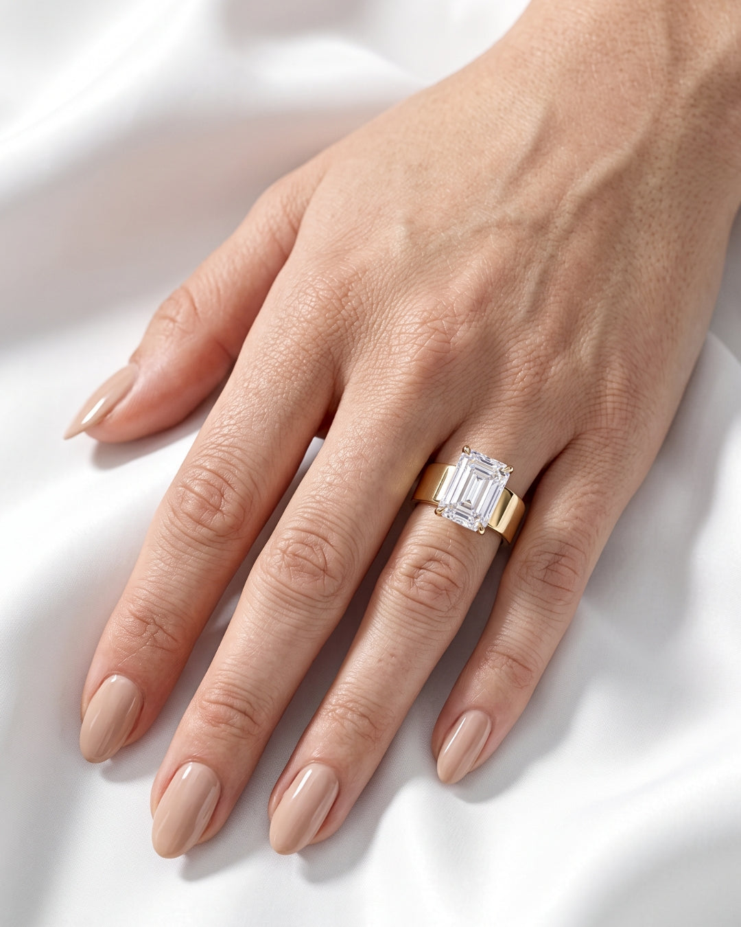 Maude: Emerald Solitaire Cigar Band Moissanite Engagement Ring
