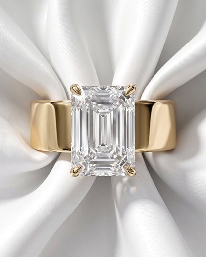 Maude: Emerald Solitaire Cigar Band Moissanite Engagement Ring