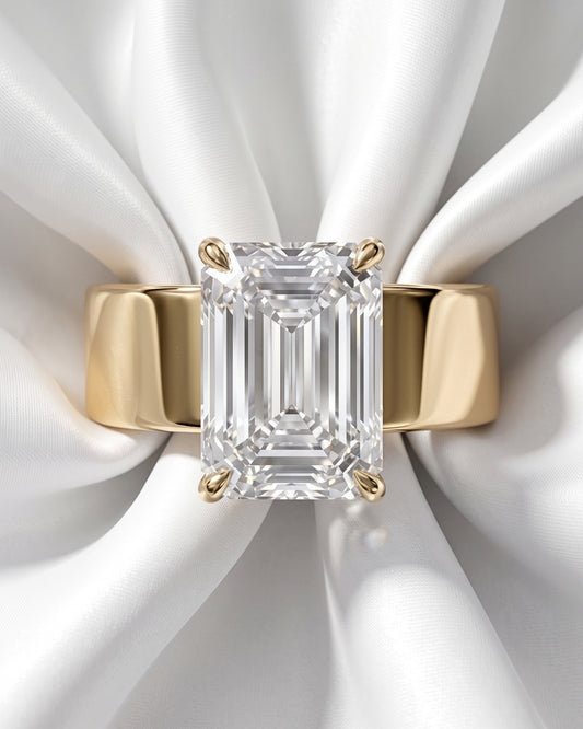 Maude: Emerald Solitaire Cigar Band Moissanite Engagement Ring