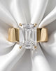 Maude: Emerald Solitaire Cigar Band Moissanite Engagement Ring
