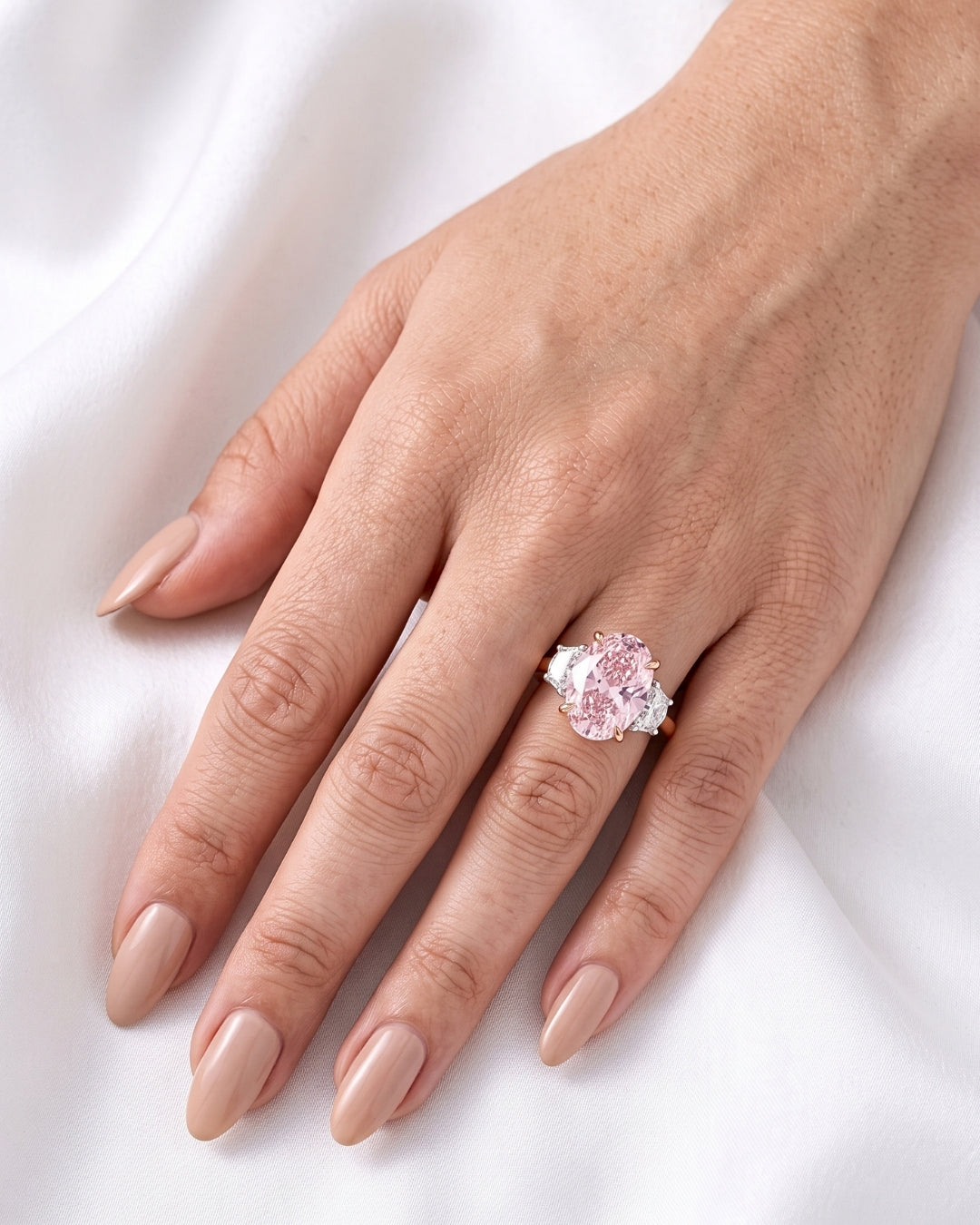 Nadine: Pink Oval with Two-Tone Half Moon Side Stones Moissanite Engagement Ring