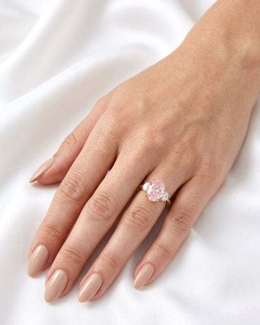 Nadine: Pink Oval with Two-Tone Half Moon Side Stones Moissanite Engagement Ring - Moissanite Engagement Rings