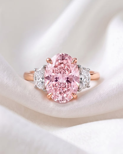 Nadine: Pink Oval with Two-Tone Half Moon Side Stones Moissanite Engagement Ring