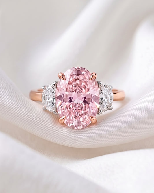 Nadine: Pink Oval with Two-Tone Half Moon Side Stones Moissanite Engagement Ring