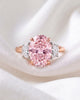 Nadine: Pink Oval with Two-Tone Half Moon Side Stones Moissanite Engagement Ring
