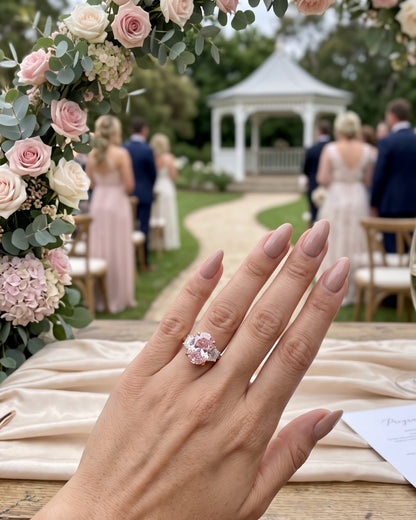 Nadine: Pink Oval with Two-Tone Half Moon Side Stones Moissanite Engagement Ring