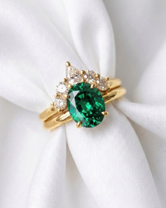 Oval Green Solitaire with Curved Cluster Wedding Band