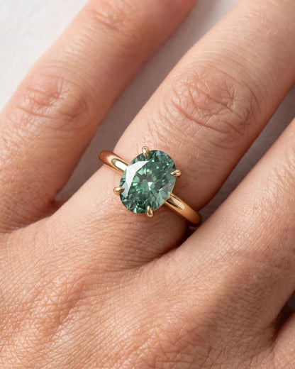 Marina - Oval Solitaire Blue-Green Moissanite Engagement Ring