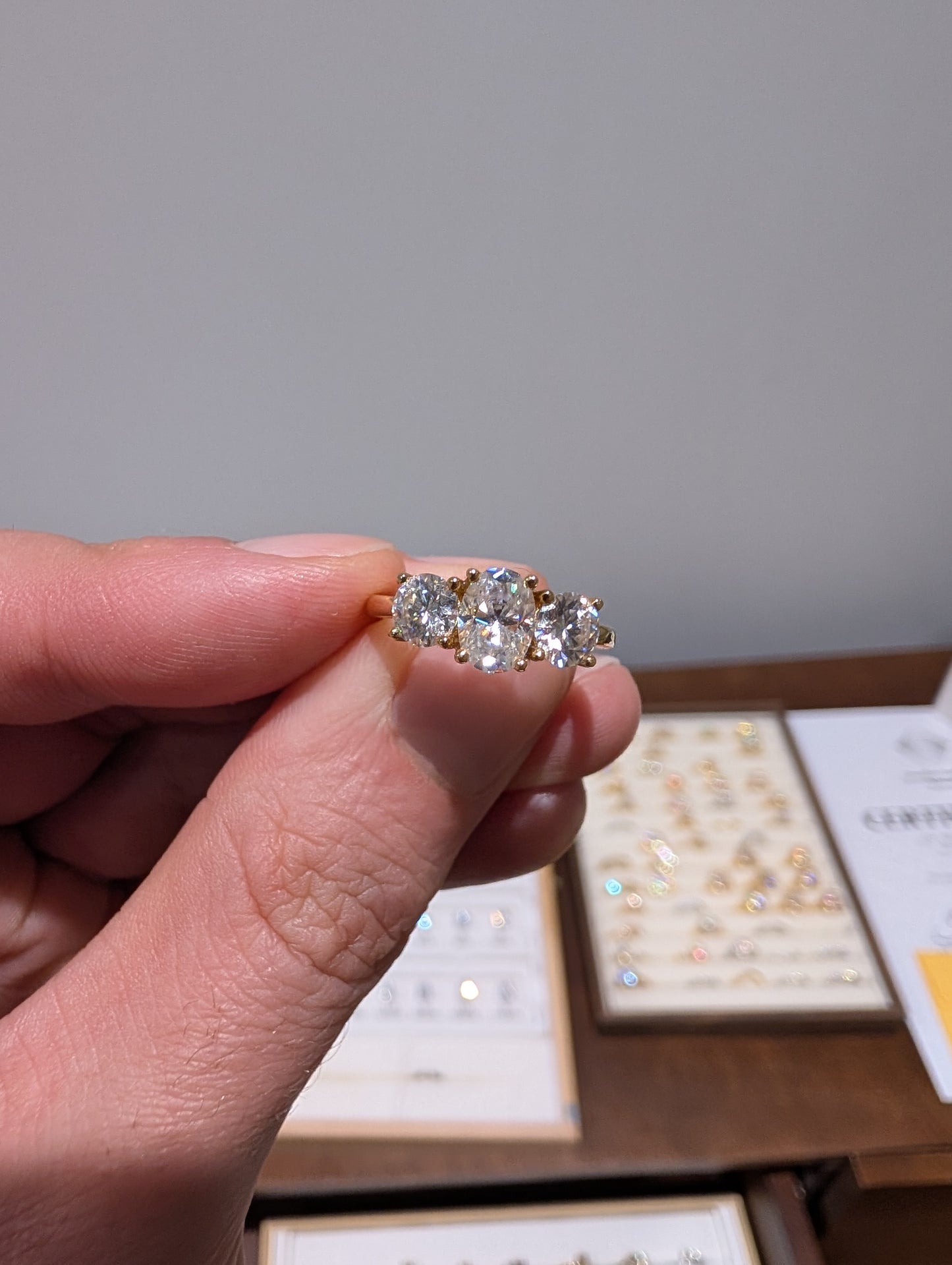 2ct Oval Trilogy Halo 18k Yellow Gold | Size J | 2mm band