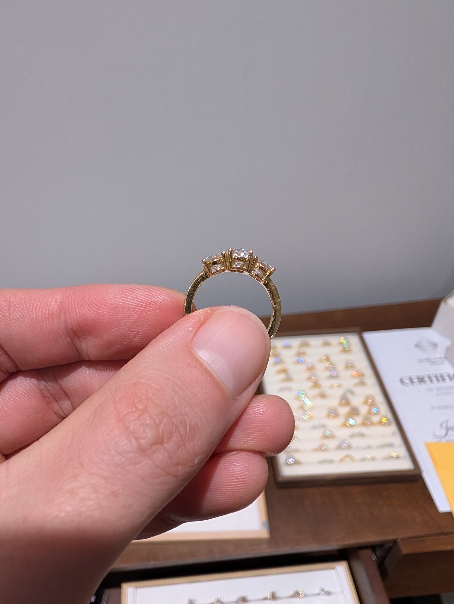 2ct Oval Trilogy Halo 18k Yellow Gold | Size J | 2mm band