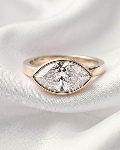 Pearl: East West Bezel Marquise Solitaire Diamond Engagement Ring
