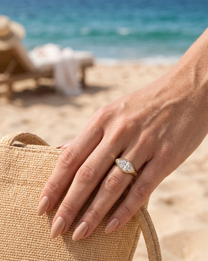 Rhea: Marquise East West Bezel Solitaire with Signet Band Moissanite Engagement Ring