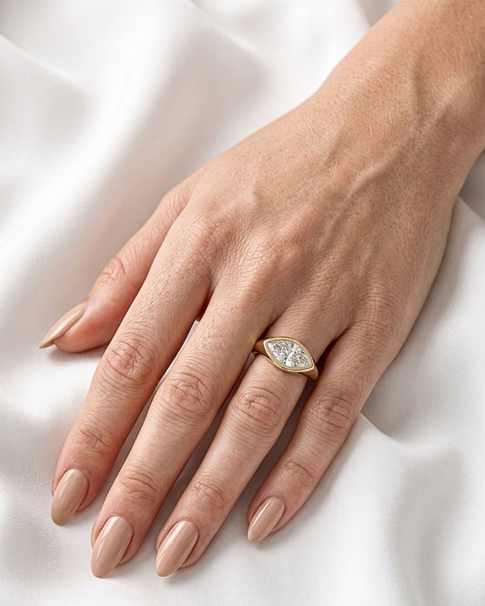 Rhea: Marquise East West Bezel Solitaire with Signet Band Moissanite Engagement Ring