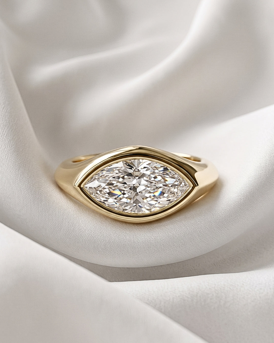 Rhea: Marquise East West Bezel Solitaire with Signet Band Moissanite Engagement Ring