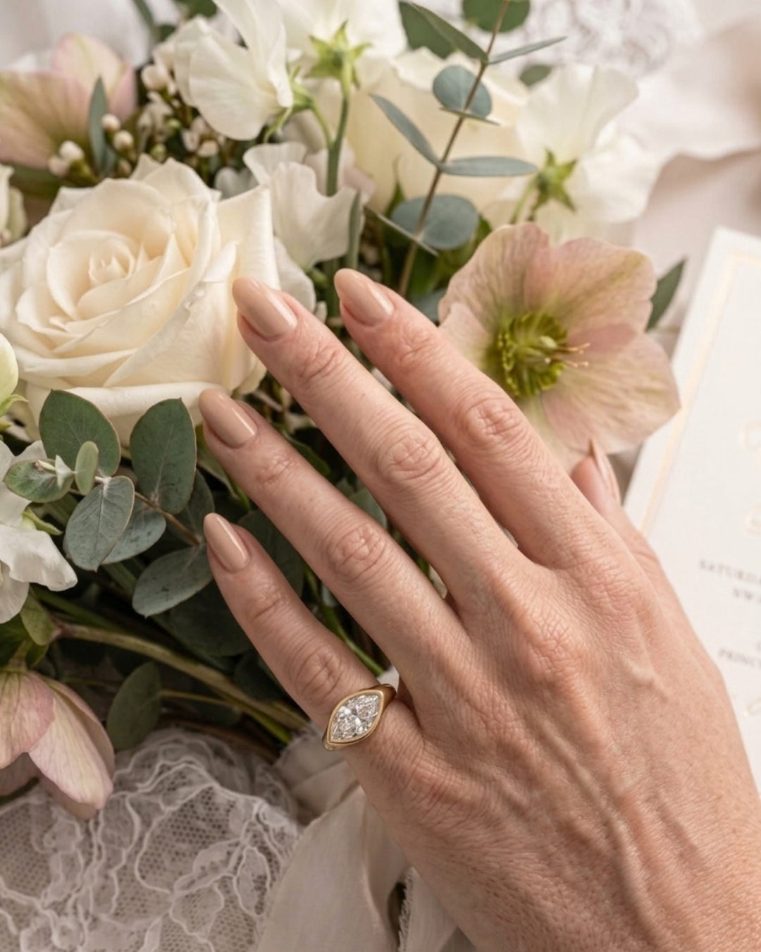 Rhea: Marquise East West Bezel Solitaire with Signet Band Ring