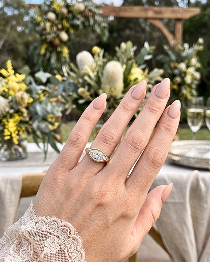 Rhea: Marquise East West Bezel Solitaire with Signet Band Moissanite Engagement Ring
