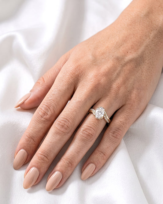 Roxie - Oval Solitaire with Twisted Pavé Band Moissanite Engagement Ring