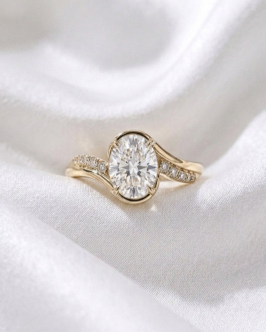 Roxie - Oval Solitaire with Twisted Pavé Band Moissanite Engagement Ring