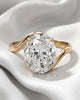 Sabine: Oval Wave Bypass Solitaire Moissanite Engagement Ring