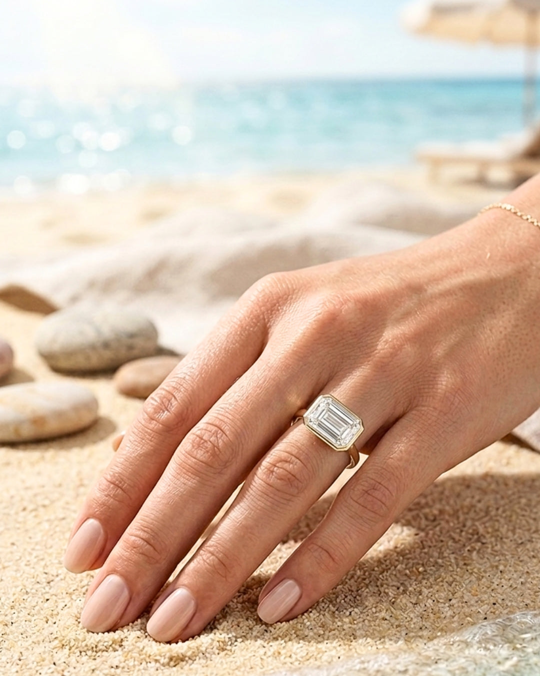 Sadie: East West Bezel Emerald Solitaire Moissanite Engagement Ring
