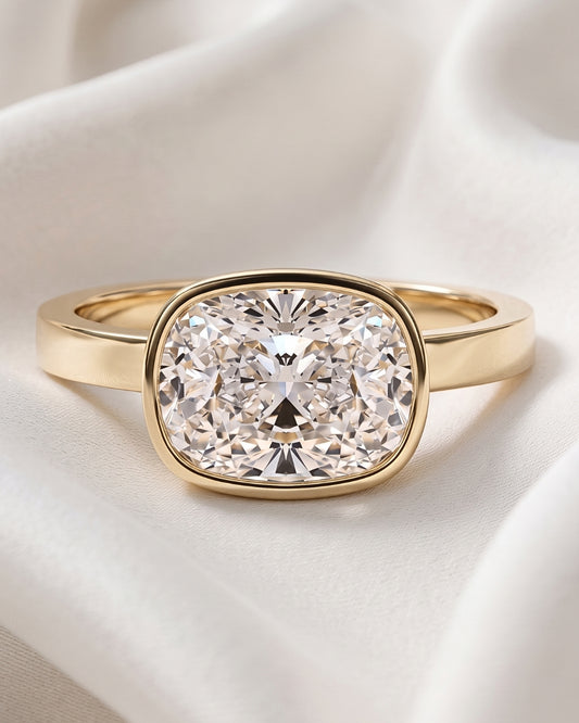 Sasha: East West Bezel Cushion Solitaire Diamond Engagement Ring