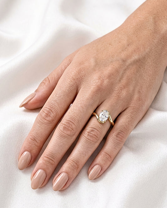 Saskia: Oval Solitaire Curved Band Moissanite Engagement Ring