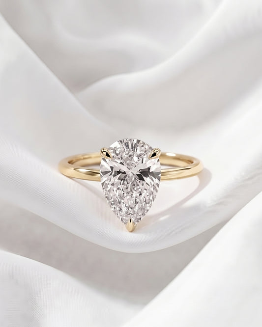 Talia: Pear Hidden Halo Moissanite Engagement Ring