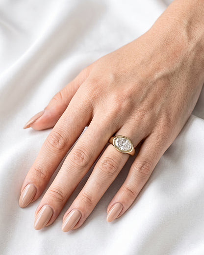 Trina: Oval East West Bezel Solitaire with Signet Band Moissanite Engagement Ring