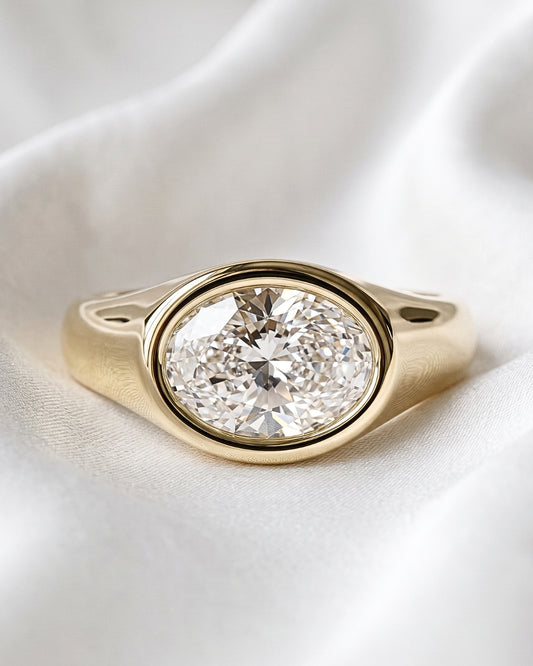 Trina: Oval East West Bezel Solitaire with Signet Band Moissanite Engagement Ring