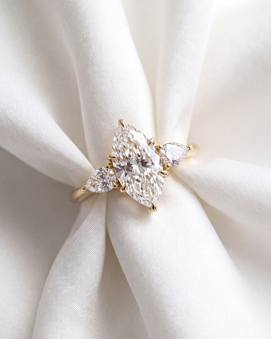 Vega: Marquise Trilogy Moissanite Engagement Ring