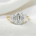 Juno — Emerald Platinum Trilogy Yellow Gold Band Moissanite Engagement Ring