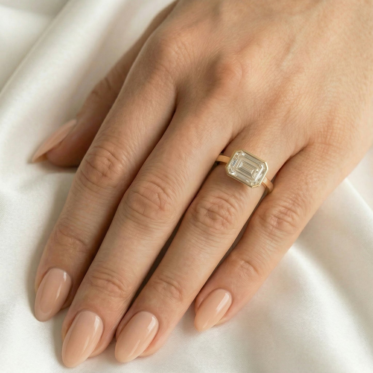 East West Bezel Emerald Solitaire Moissanite Engagement Ring