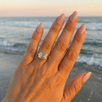 East West Bezel Emerald Solitaire Moissanite Engagement Ring