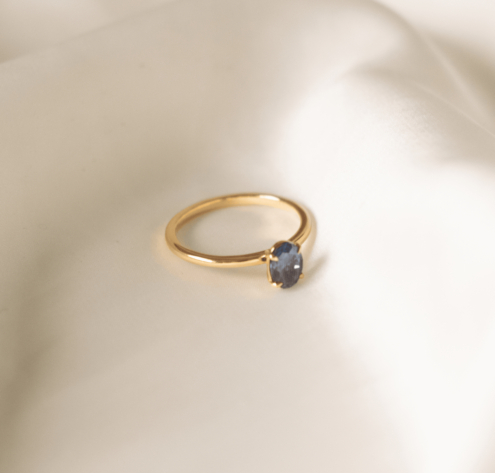 Oval Blue Solitaire Engagement Ring - moissaniteengagementrings