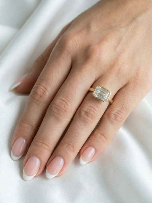 East West Bezel Emerald Solitaire Moissanite Engagement Ring