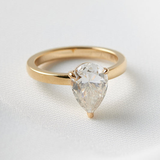 moissanite, pear solitaire, gold band, engagement ring | Moissanite Engagement Rings 