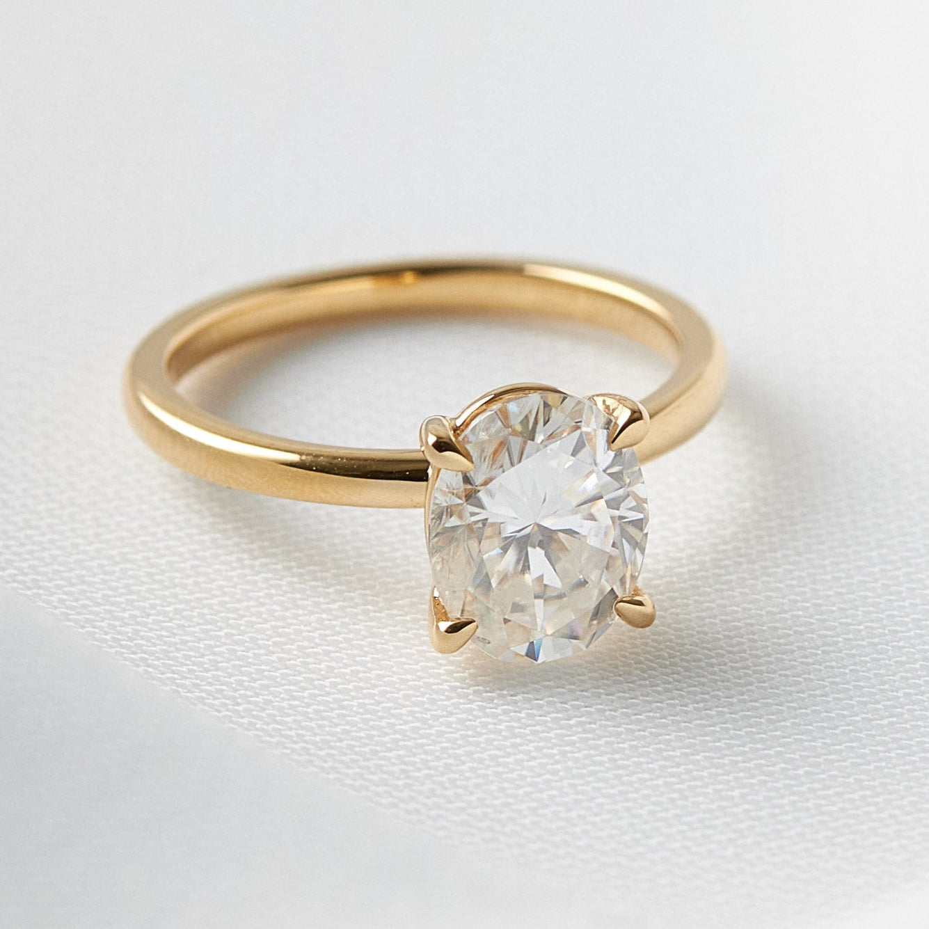 moissanite, oval solitaire, gold band, engagement ring | Moissanite Engagement Rings 