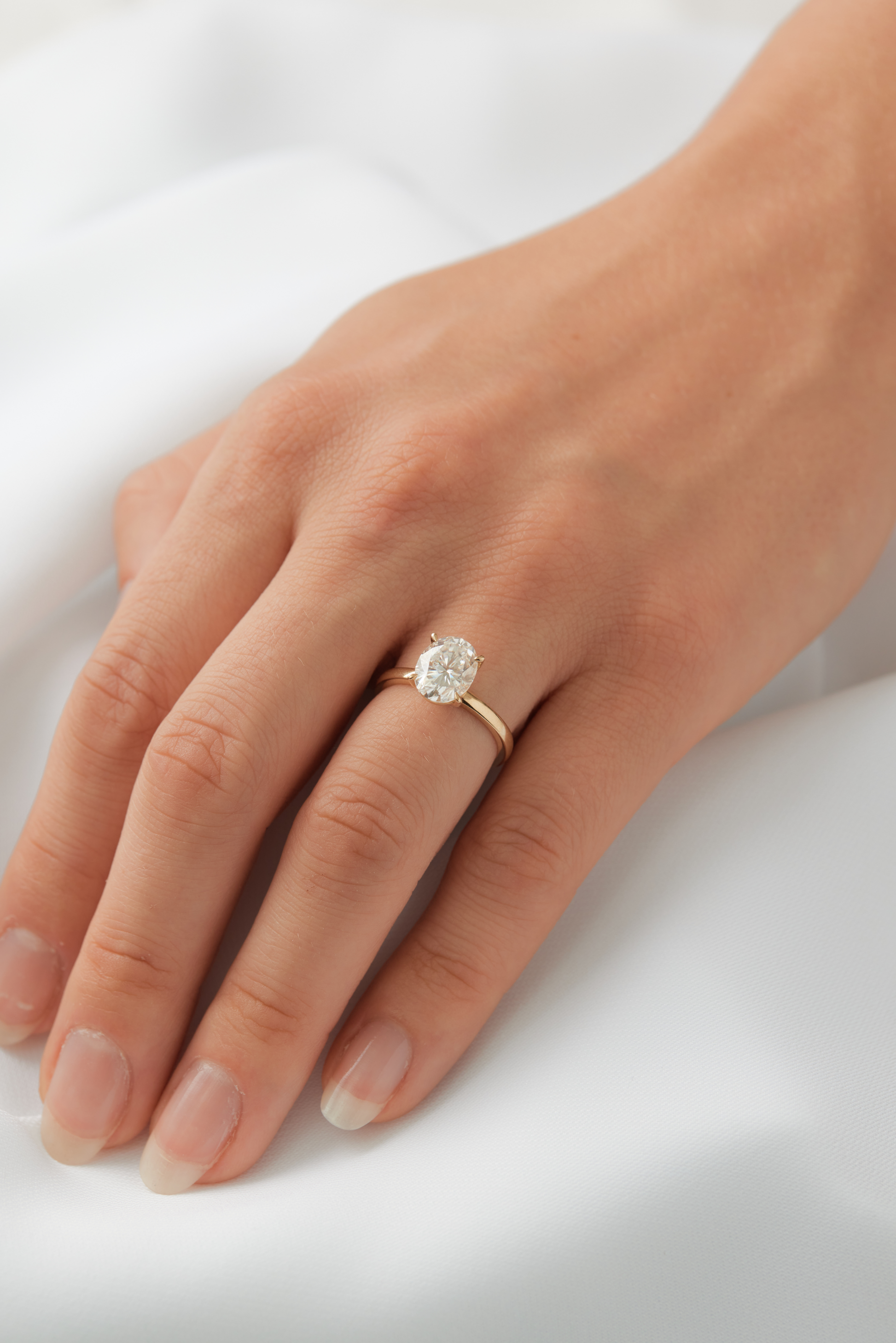 moissanite, oval solitaire, gold band, engagement ring | Moissanite Engagement Rings 
