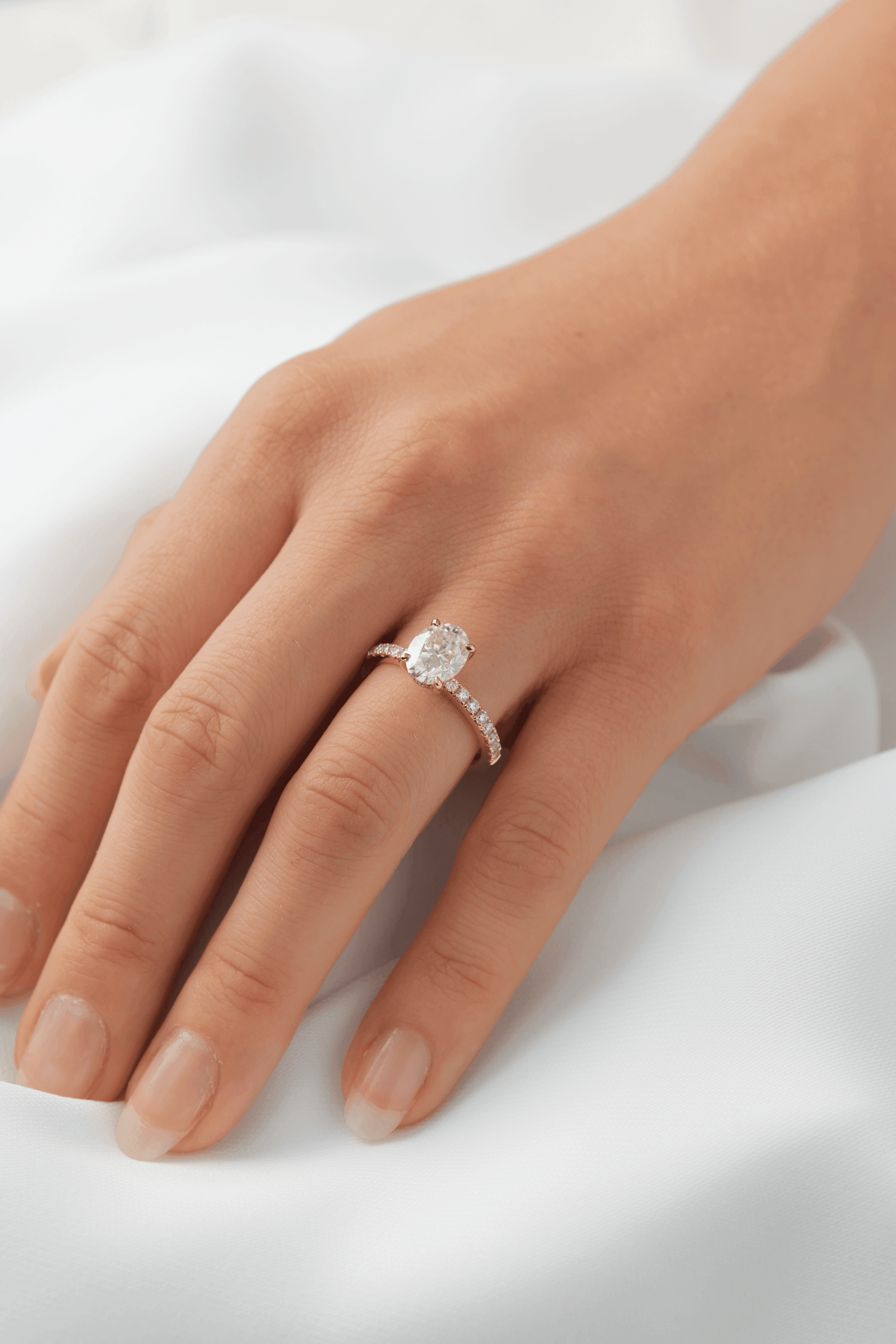 Oval Half Pavè Hidden Halo Moissanite Engagement Ring - Moissanite Engagement Rings