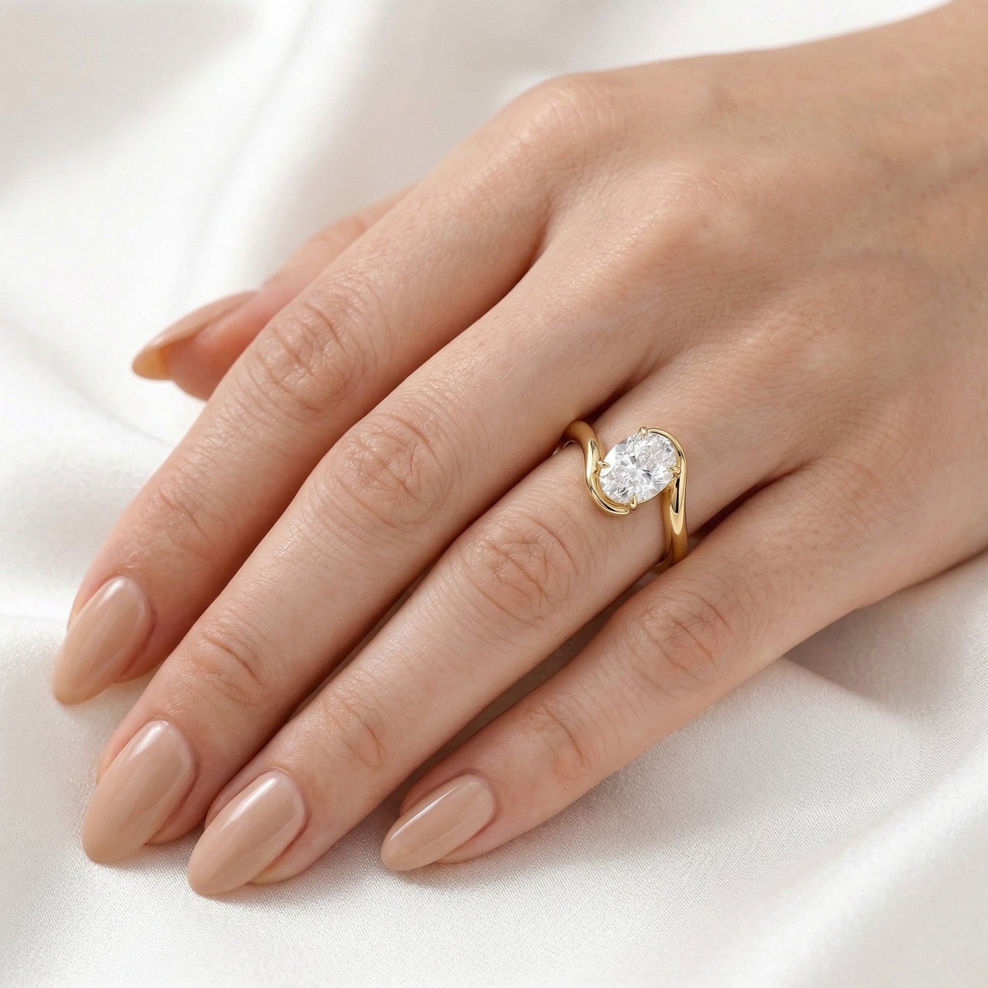 Oval Solitaire Curved Band Moissanite Engagement Ring — Guthrie Jewellery
