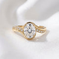 Roxie — Oval Solitaire with Twisted Pavé Band Moissanite Engagement Ring