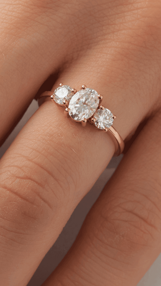 Oval Trilogy Round Setting Diamond Engagement Ring