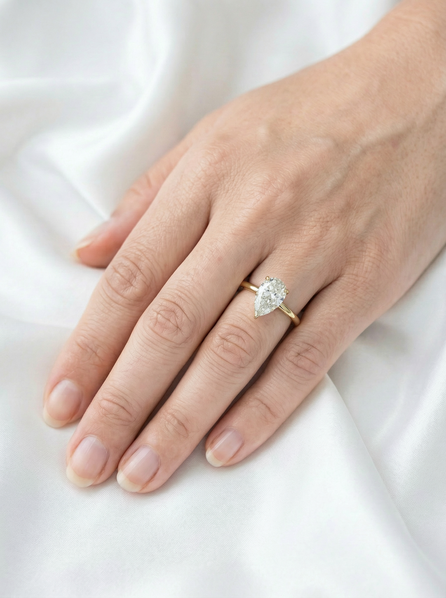 Pear Hidden Halo Moissanite Engagement Ring