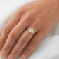 moissanite, pear solitaire, gold band, worn on hand, engagement ring | Moissanite Engagement Rings 