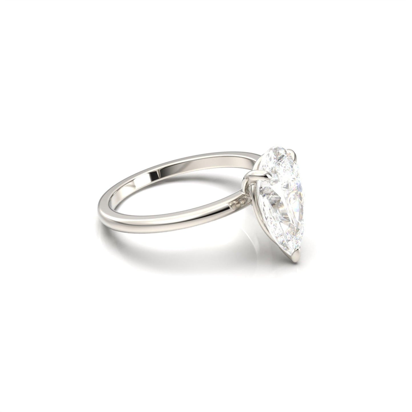 Pear Solitaire 3 Claw - moissaniteengagementrings