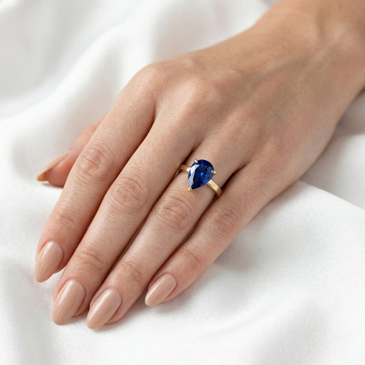 Pear Solitaire Blue Diamond Engagement Ring