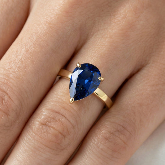 Pear Solitaire Blue Diamond Engagement Ring