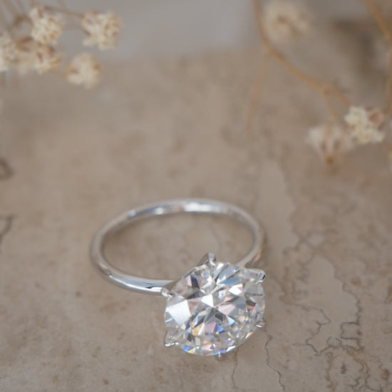 Round Solitaire Diamond Engagement Ring video — on hand