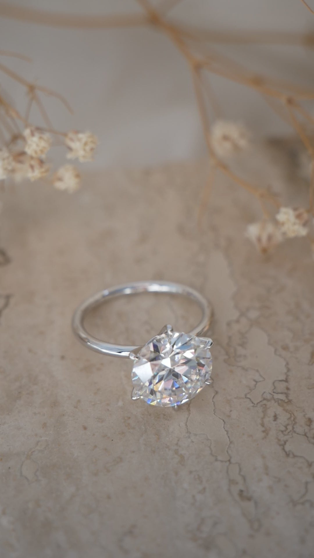 Round Solitaire Diamond Engagement Ring video — on hand